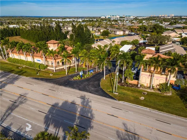 Aerial view of Entrance to the community-Right across the street of the future Calusa Grande