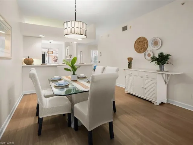 Dining room featuring light wood finished floors and recessed lighting