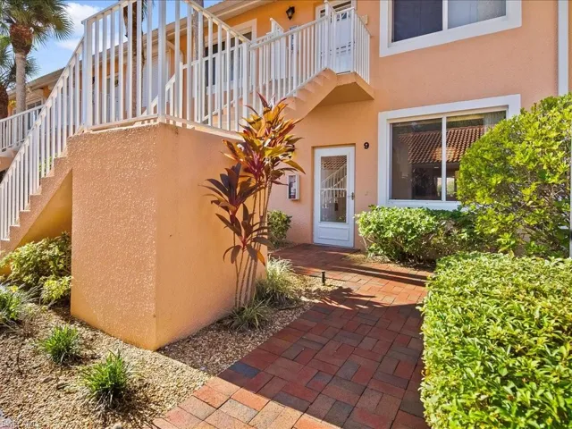 View of exterior entry featuring stucco siding