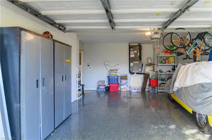 Garage with heating unit and a garage door opener
