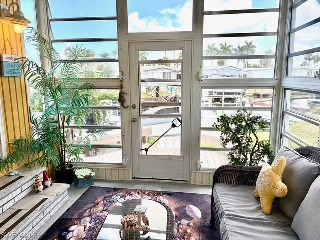 Sunroom with concrete floors
