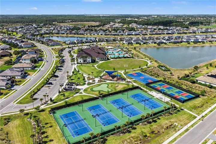 Expansive community amenities including multiple tennis courts, pickleball courts, a basketball court, and a putting green