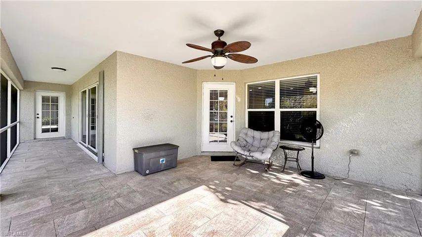 View of patio / terrace featuring french doors and ceiling fan
