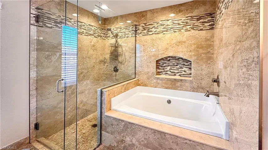 Bathroom with independent shower and bath