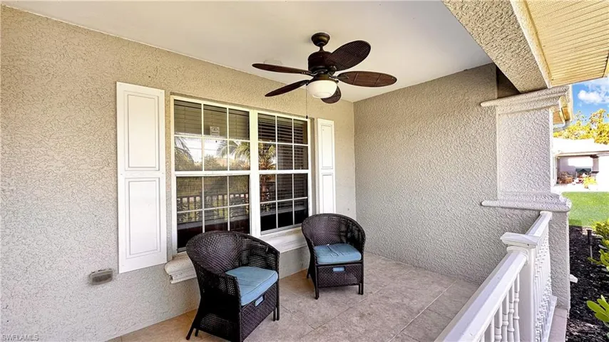 Balcony featuring ceiling fan