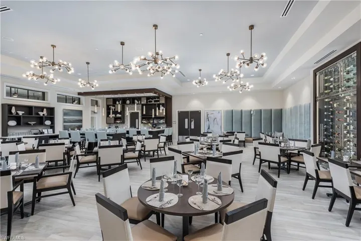 Dining space featuring a chandelier and a tray ceiling