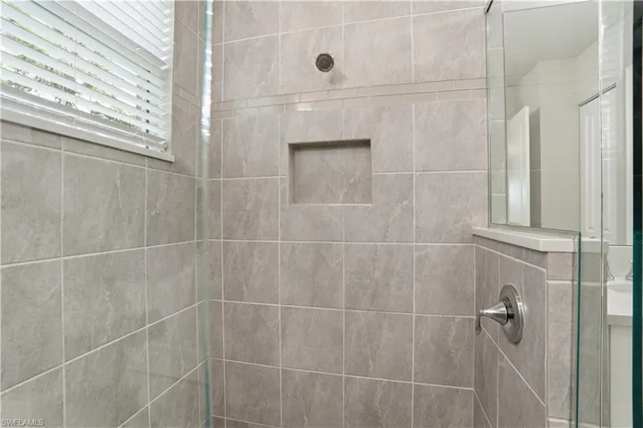 Bathroom featuring a shower stall
