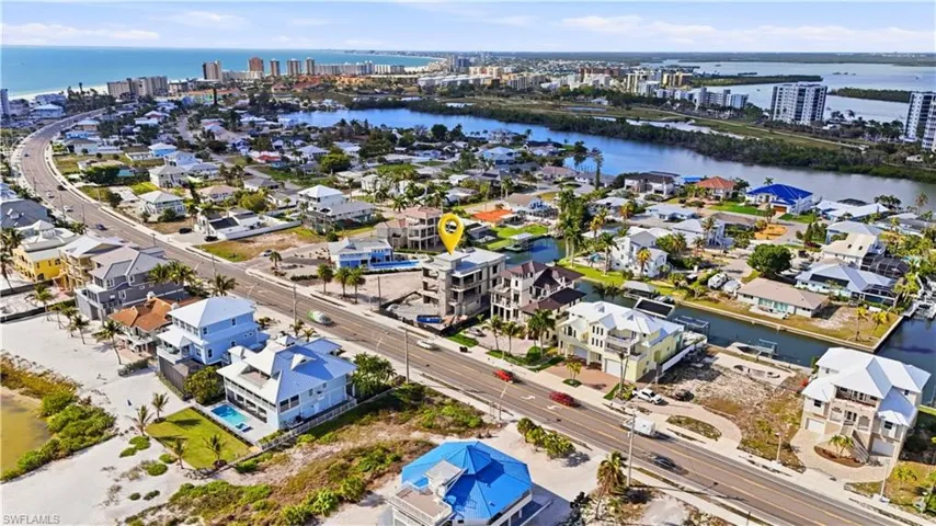 View of urban area featuring a large body of water - Virtually Edited Image