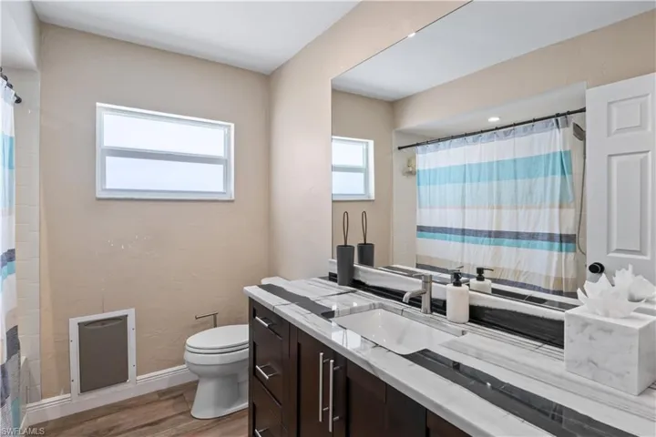The guest bathroom is a welcoming and thoughtfully designed space.
