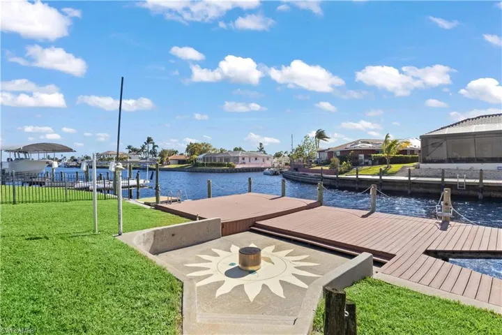 Stretching into the water, the dock offers a peaceful escape with breathtaking waterfront views.