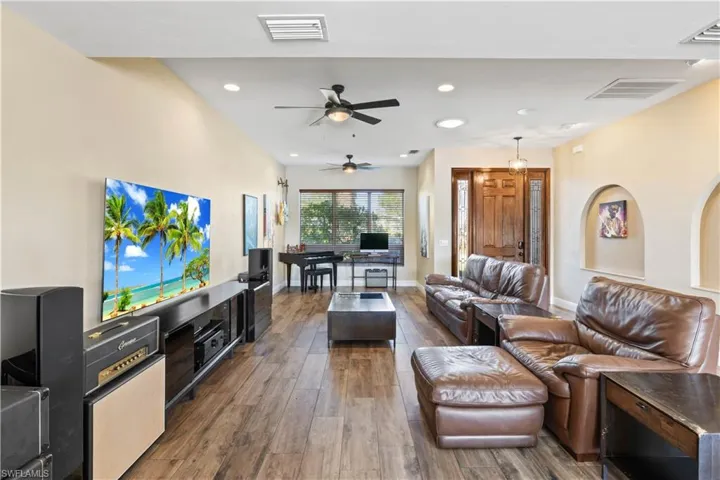 This bright and airy living space features an open-concept design.