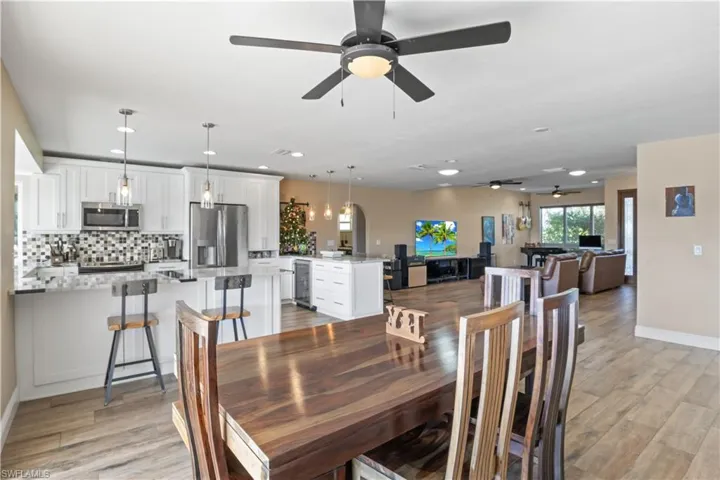Whether it's a casual breakfast or a formal dinner, the dining space seamlessly blends comfort with style.