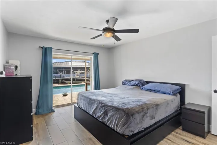 The primary bedroom is a serene sanctuary, thoughtfully designed to offer both comfort and style.