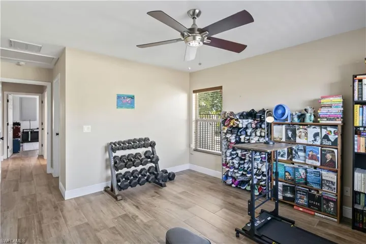 The guest bedroom has been creatively repurposed into a home gym.