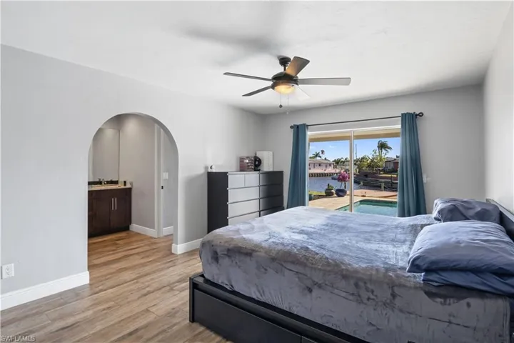 What truly sets this room apart, however, is the sliding glass door that opens directly to the pool area.
