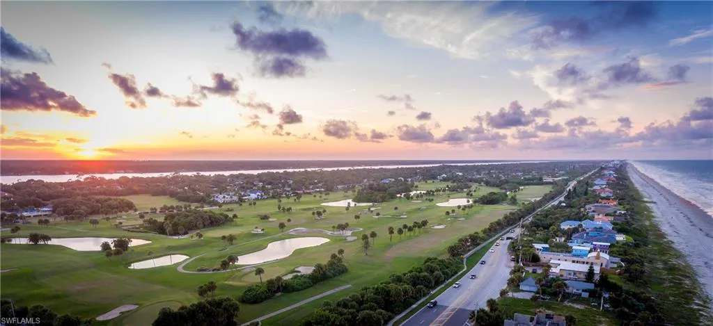 Aerial view at dusk with a water view