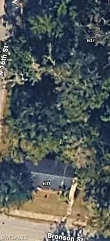 Aerial View. Showing the property at 601 Bronson St, with parcel 607 and N 16th St visible