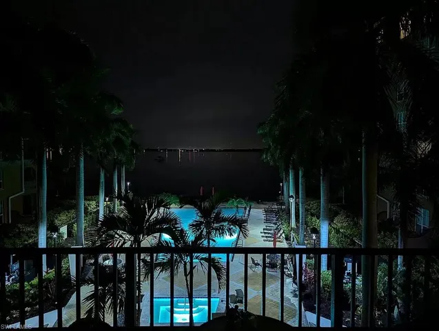 View of pool at twilight