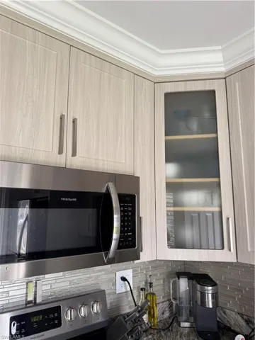 Custom cabinetry to ceiling.  Crown molding completing the aesthetics.