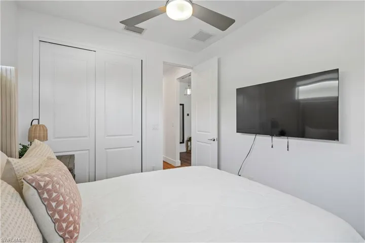 Bedroom featuring a closet and a ceiling fan