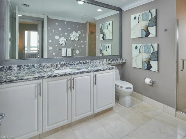 Full guest bathroom with walk in shower and gorgeous finishes.
