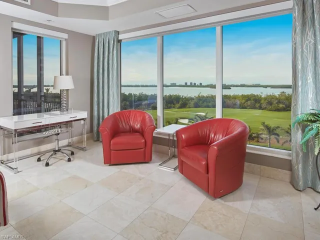 From the living area, take in expansive views of The Estero Bay, through large windows that fill the space with natural light.