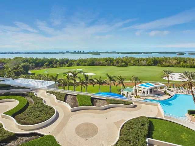From the 7th floor, enjoy a picturesque view of the pool, bay, and beautifully landscaped grounds, creating a tranquil and scenic backdrop.