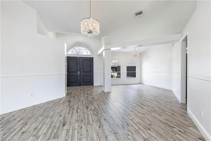 Front door/Foyer into Family Room/Den