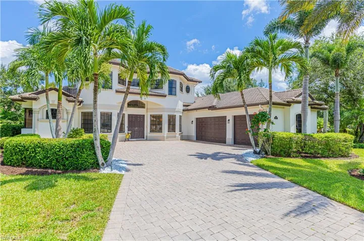 Mediterranean / spanish-style house featuring a front lawn