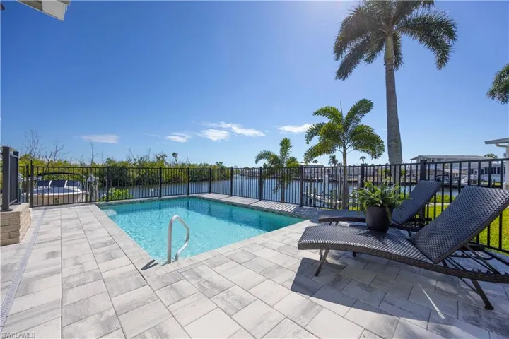 Private canal-front pool with open water views