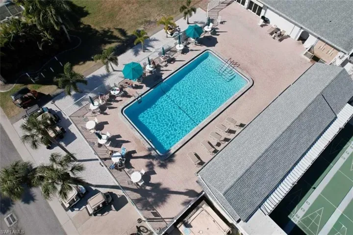 Resort-style community pool with expansive sun deck