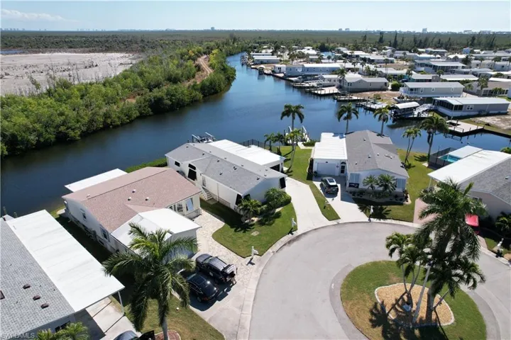 Wide intersecting canal views with protected mangrove backdrop