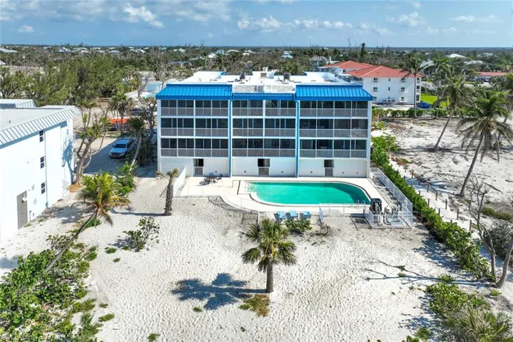 Community pool with a patio area