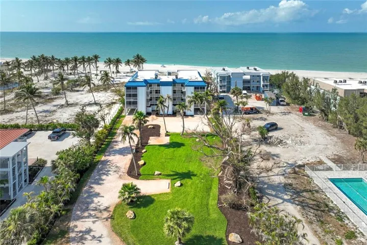 Aerial view of a large body of water and apartment complex