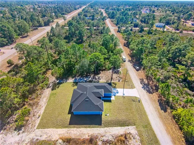 Aerial view of property and surrounding area