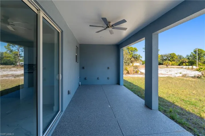 View of patio with ceiling fan