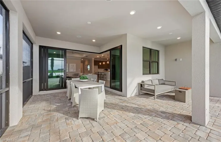 Zero corner sliders onto covered lanai