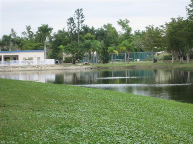 View of lake , pool area, and tennis court.