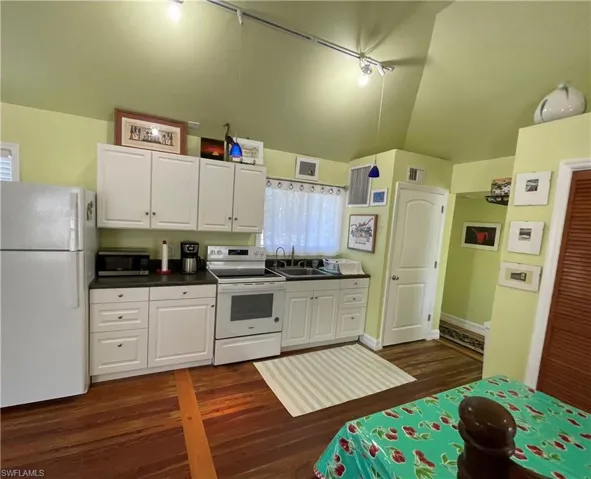 Kitchen in rental cottage with wood floors