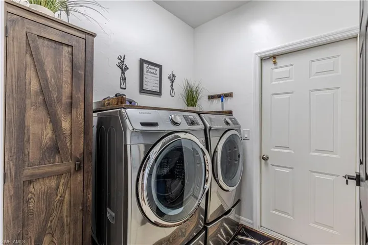 Laundry area with washing machine and dryer