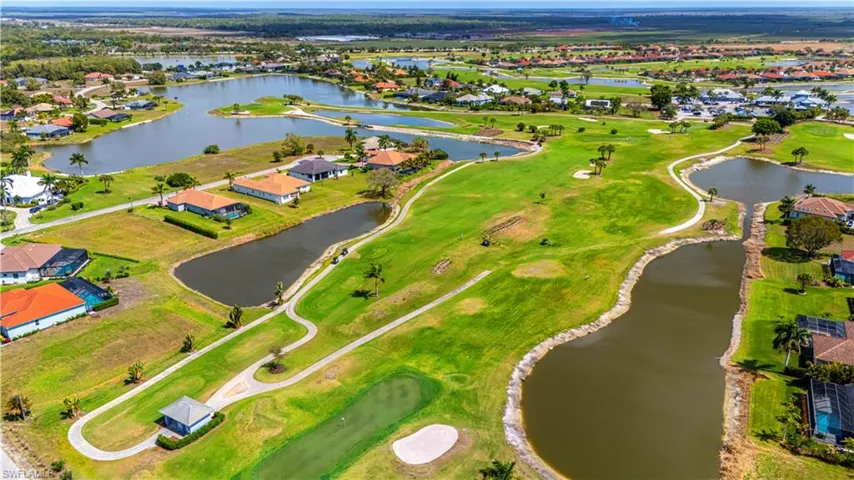 Aerial overview of property's location with nearby suburban area