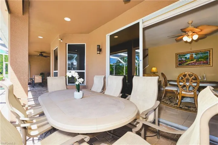 View of patio / terrace featuring a ceiling fan and outdoor dining space