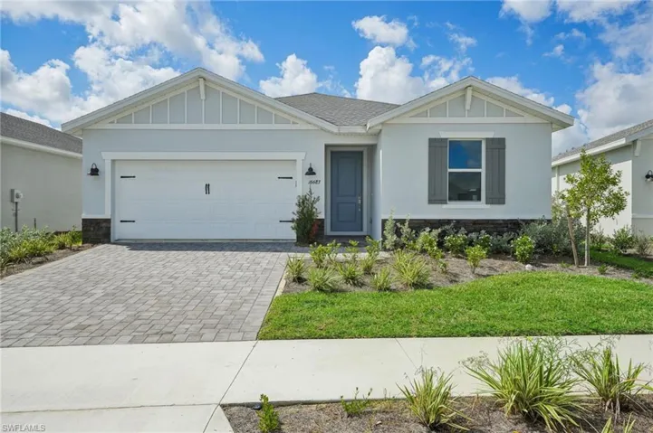 View of front of property with a garage
