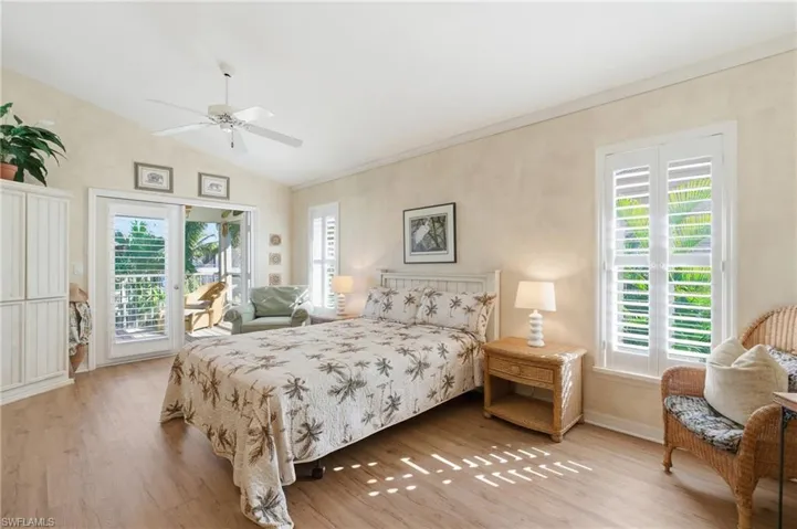 Large open primary suite with access to screened porch