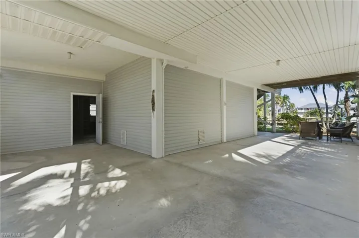 Covered area for parking golf cart or entertaining