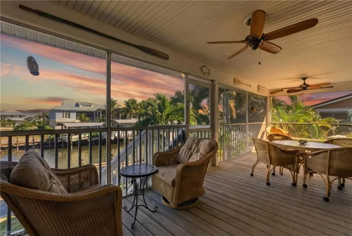 Screened porch to watch the sunrise - photo enhanced.