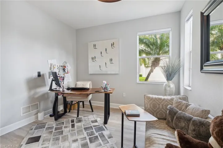 Office space featuring hardwood / wood-style flooring