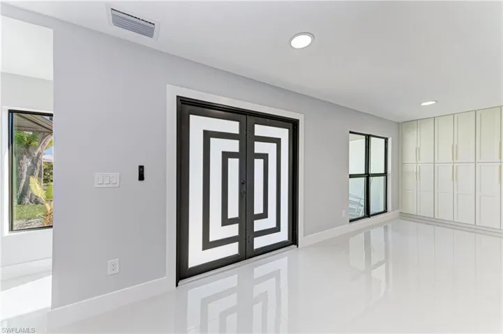 Foyer with recessed lighting
