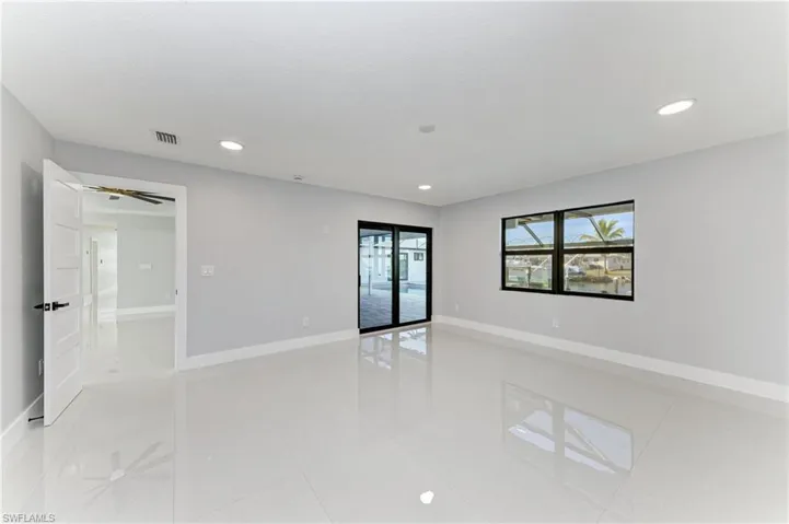 Spare room with recessed lighting and light tile patterned floors