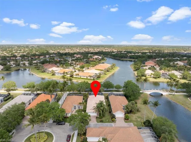 Drone / aerial view featuring a residential view and a water view